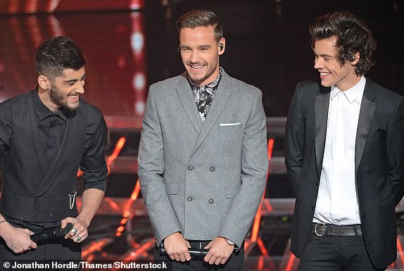 Editorial use only. No book publishing Mandatory Credit: Photo by Jonathan Hordle/Thames/Shutterstock (3382639p) Guest stars - One Direction - Zayn Malik, Liam Payne and Harry Styles 'The X Factor' TV show, London, Britain - 24 Nov 2013