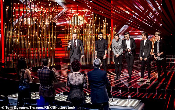 Editorial use only. No book publishing Mandatory Credit: Photo by Tom Dymond/Thames/REX/Shutterstock (3382632an) Guest stars - One Direction - Zayn Malik, Liam Payne, Harry Styles, Louis Tomlinson and Niall Horan with Dermot O'Leary and judges Nicole Scherzinger, Gary Barlow, Sharon Osbourne and Louis Walsh 'The X Factor' TV show, London, Britain - 24 Nov 2013