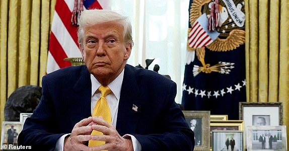 FILE PHOTO: FILE PHOTO: U.S. President Donald Trump sits in the Oval Office of the White House in Washington, D.C., U.S., March 7, 2025. REUTERS/Leah Millis/File Photo/File Photo